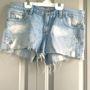 Jean shorts! With flowers on the pockets and throughout the jeans!